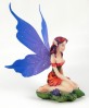 Purple Wing Fairy Kneeling on Leaves