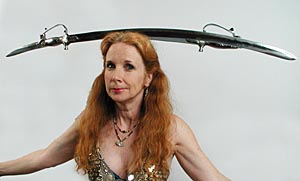 Balancing two belly dancing swords